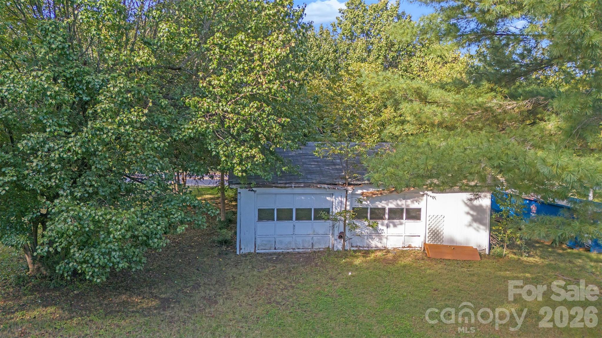 208 East Main Street Cleveland, NC 27013 - Photo 19 of 48 front view of a house with a yard