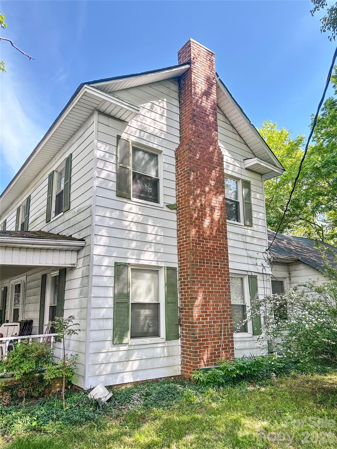 208 East Main Street Cleveland, NC 27013 - Photo 27 of 48 front view of a house with a yard