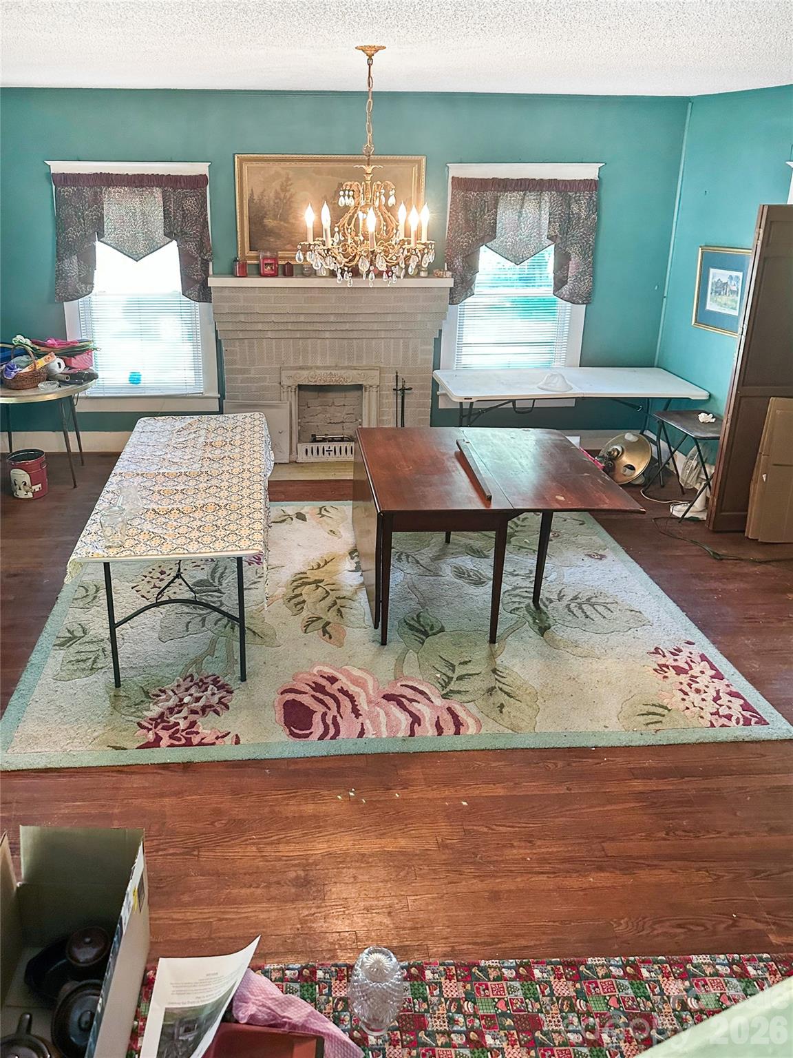 208 East Main Street Cleveland, NC 27013 - Photo 28 of 48 a living room with furniture and a table