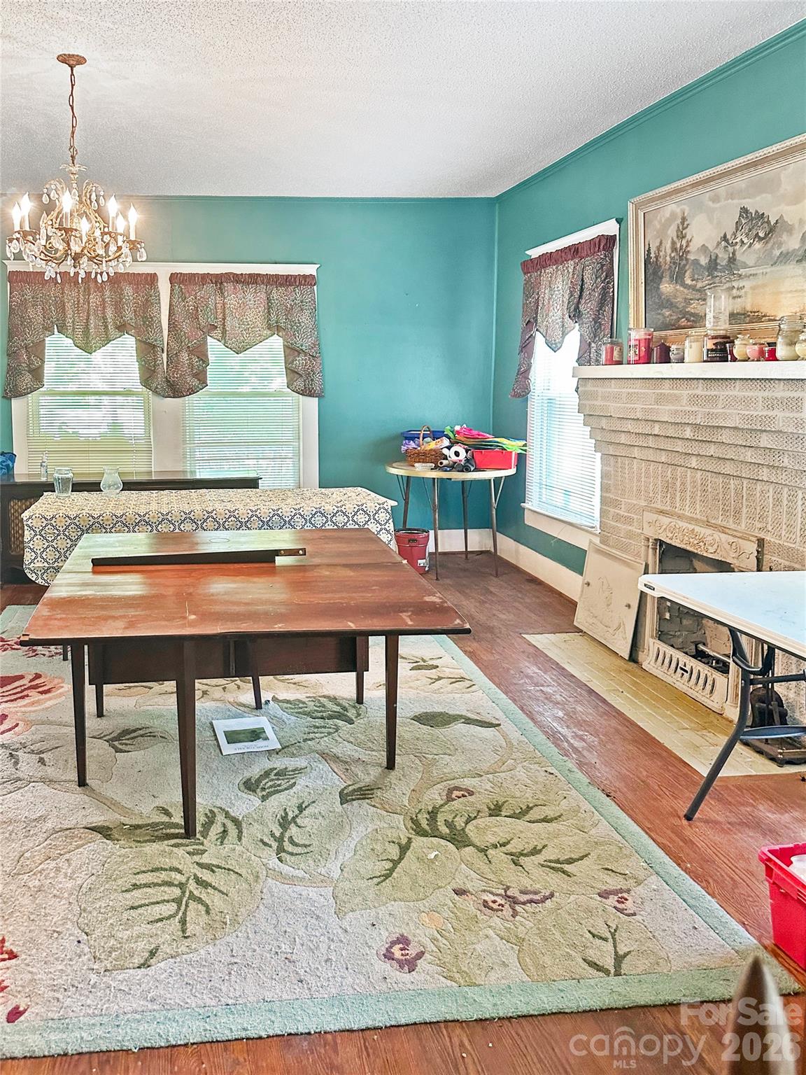 208 East Main Street Cleveland, NC 27013 - Photo 29 of 48 a living room with furniture and a table