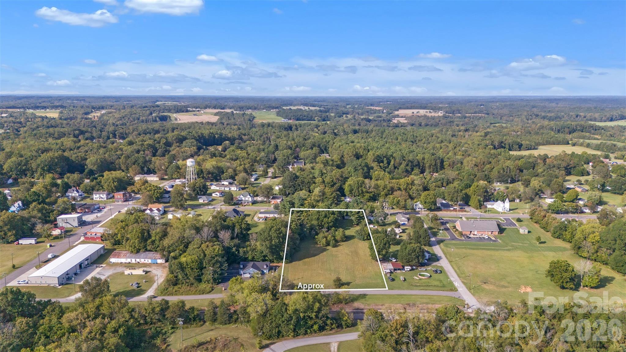 208 East Main Street Cleveland, NC 27013 - Photo 3 of 48 an aerial view of residential house with outdoor space