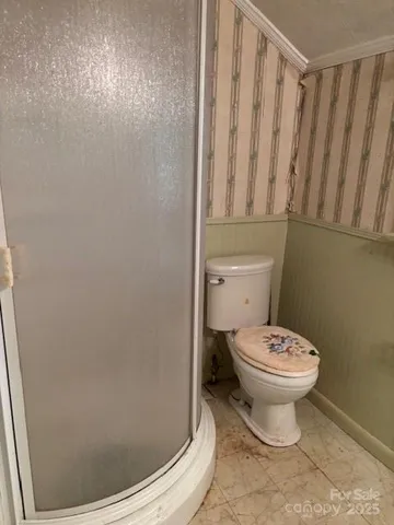 a spacious bathroom with a sink a mirror and a shower