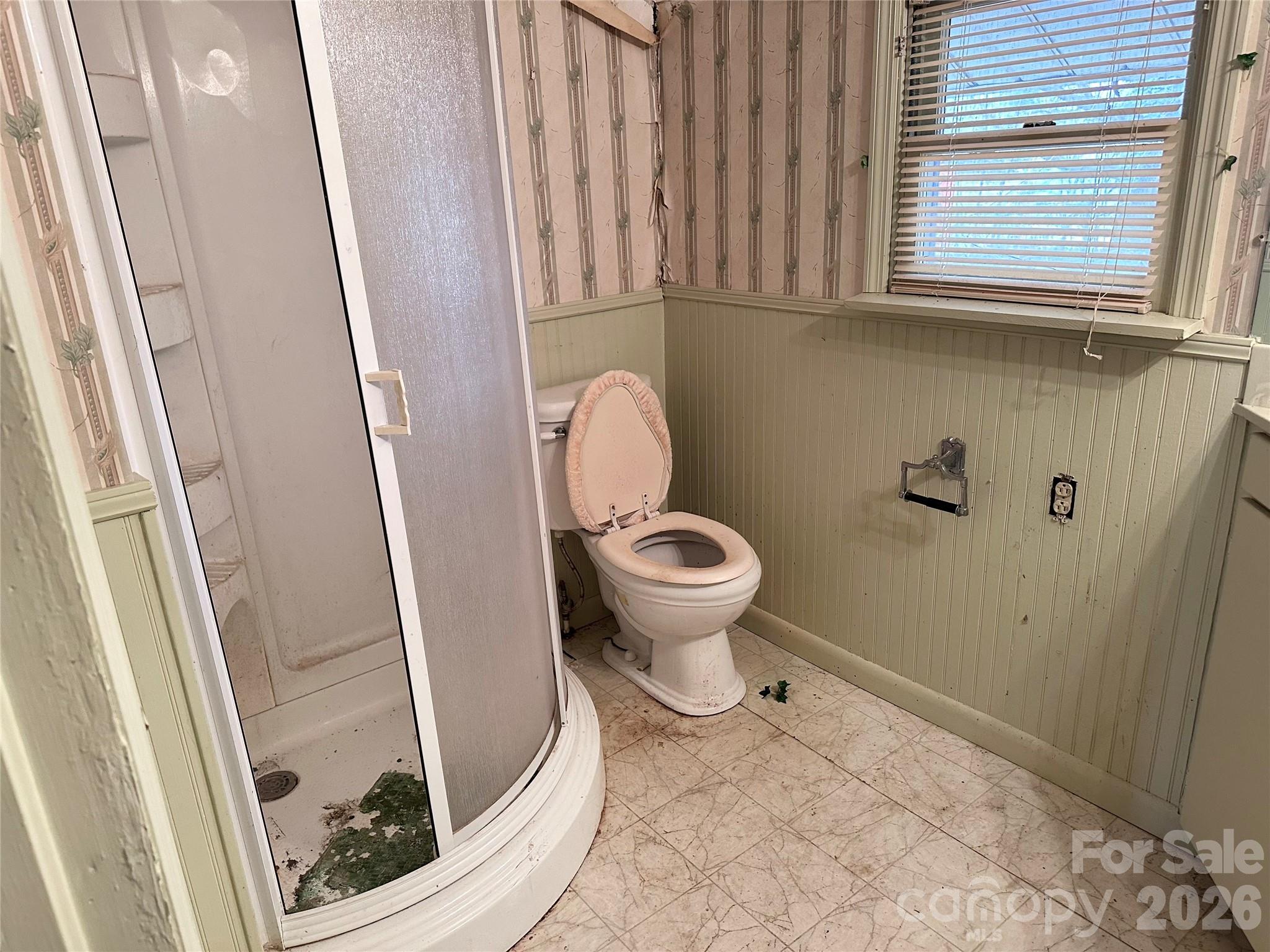 208 East Main Street Cleveland, NC 27013 - Photo 38 of 48 a bathroom with a sink and a toilet