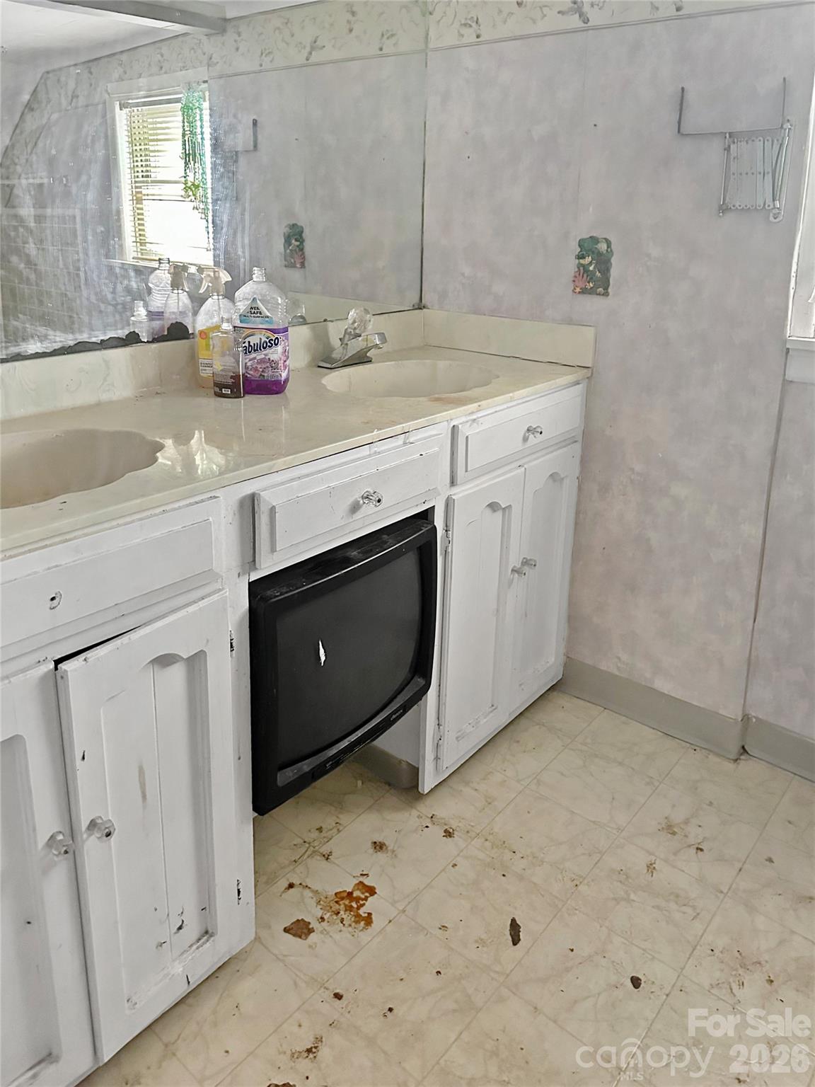208 East Main Street Cleveland, NC 27013 - Photo 46 of 48 a spacious bathroom with a sink a mirror and a shower