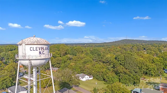 a view of a balcony with chair and table