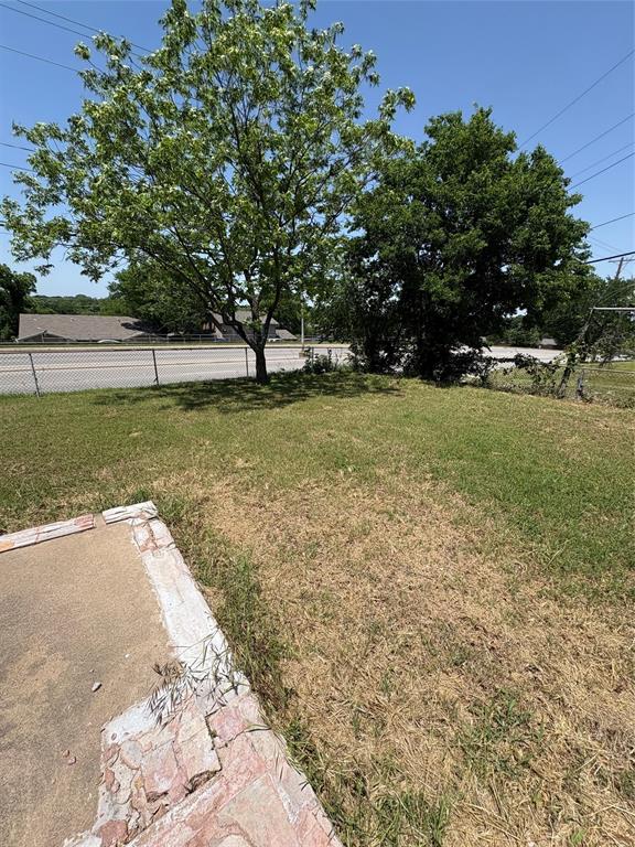 2306 Greenland Drive Dallas, TX 75228 - Photo 13 of 18 a view of backyard with green space