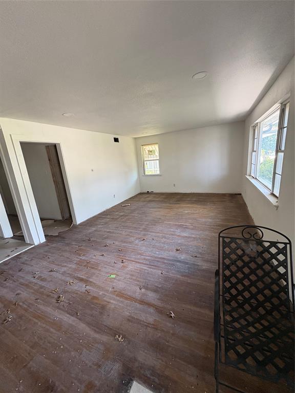 2306 Greenland Drive Dallas, TX 75228 - Photo 2 of 18 en empty room with windows