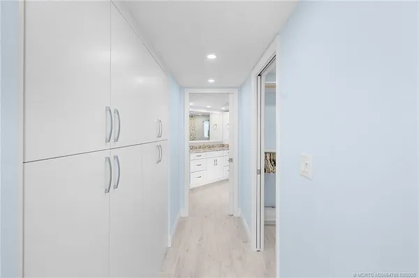 a bathroom with a toilet sink and shower