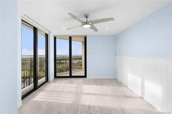 a view of balcony with furniture