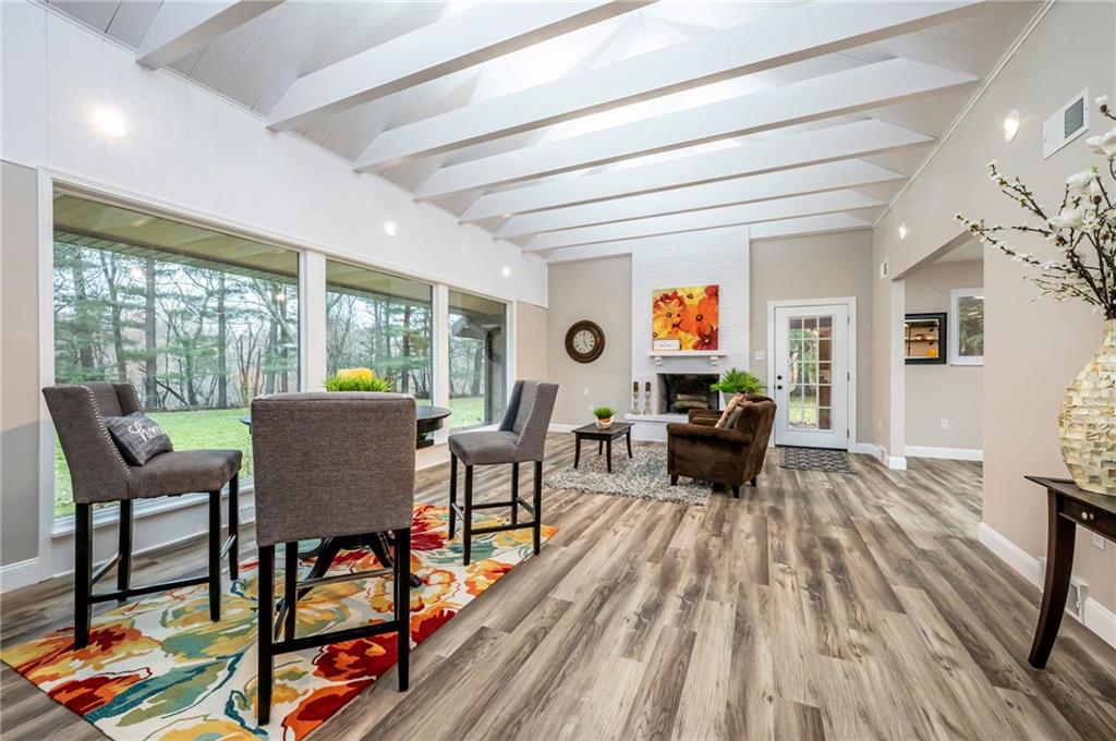 630 Bascom Avenue Pittsburgh, PA 15212 - Photo 4 of 25 a living room with furniture and a wooden floor