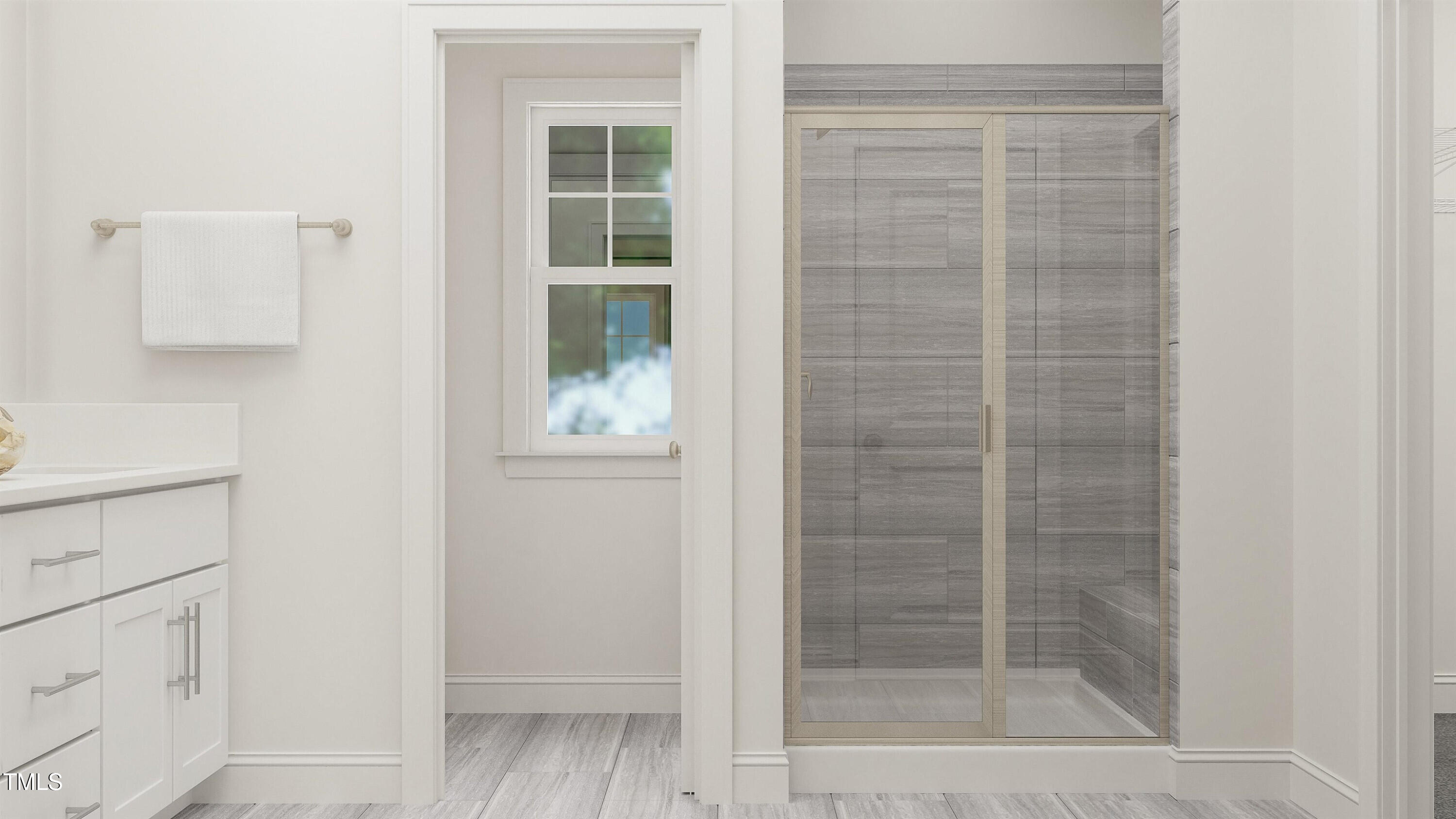 165 Corapeake Way Apex, NC 27539 - Photo 22 of 38 a bathroom with a shower