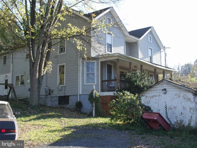 550 Remount Road Front Royal, VA 22630 - Photo 3 of 10 a view of a house with a yard