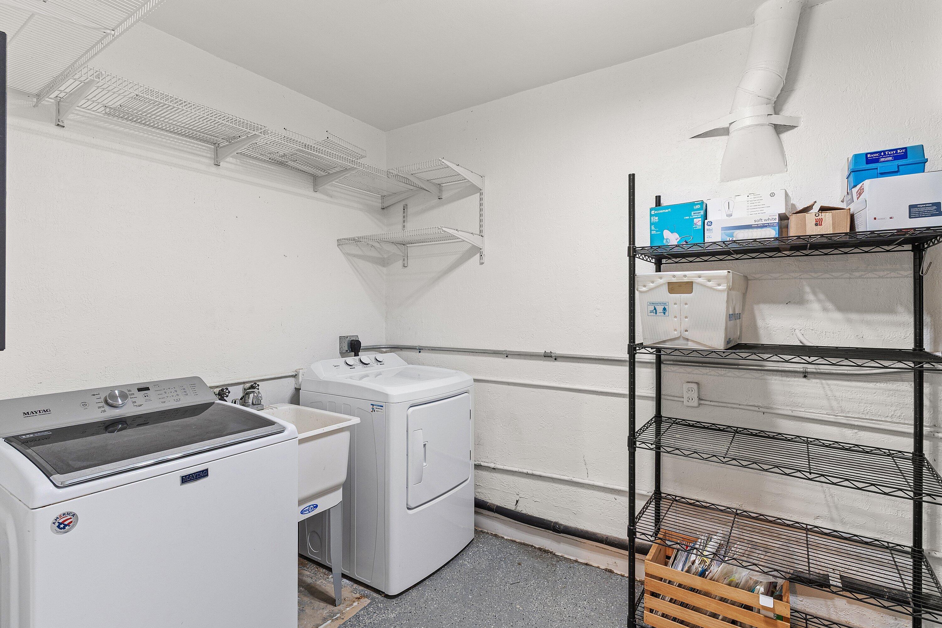 451 Northeast 25th Terrace Boca Raton, FL 33431 - Photo 29 of 47 a utility room with dryer and washer