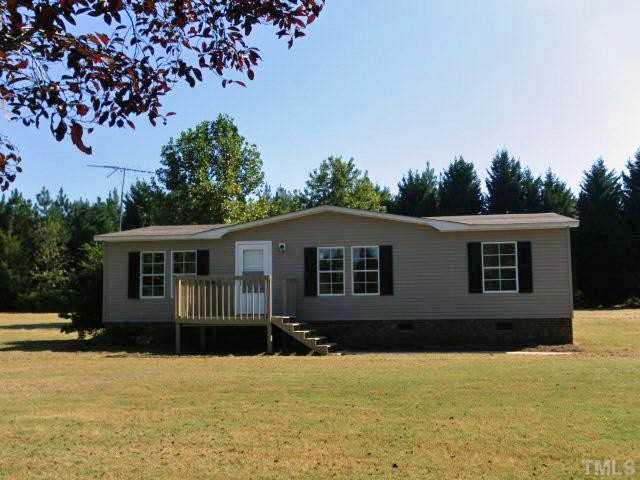 Completely remodeled interior offers 3 bedrooms, 2 bath home on 1.38 acre lot.