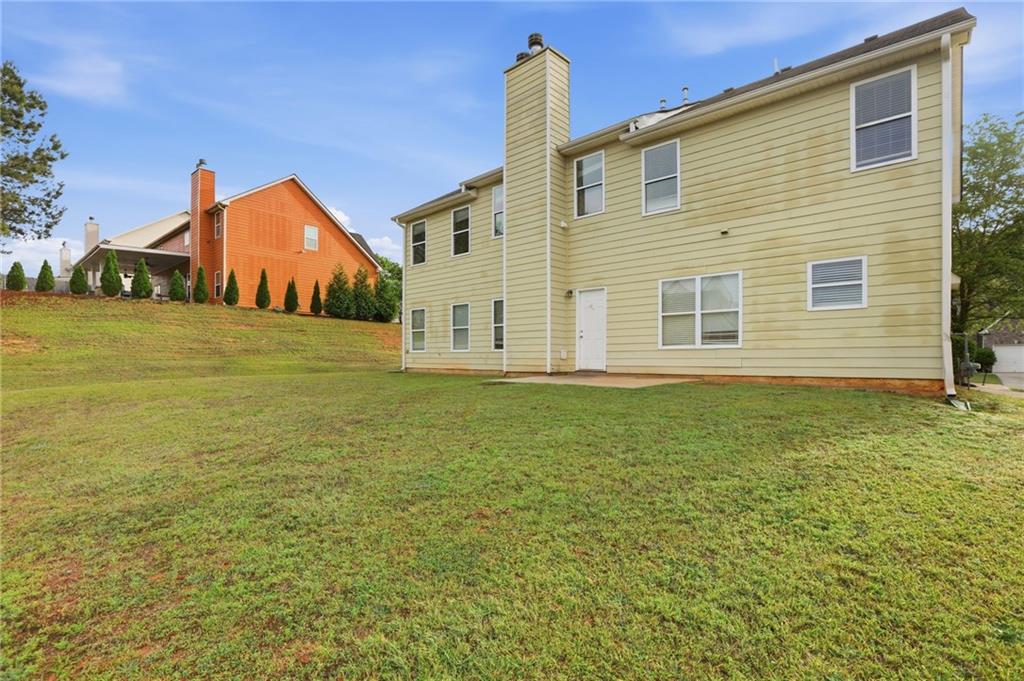 4968 Locherby Drive Fairburn, GA 30213 - Photo 35 of 39 a house view with a outdoor space