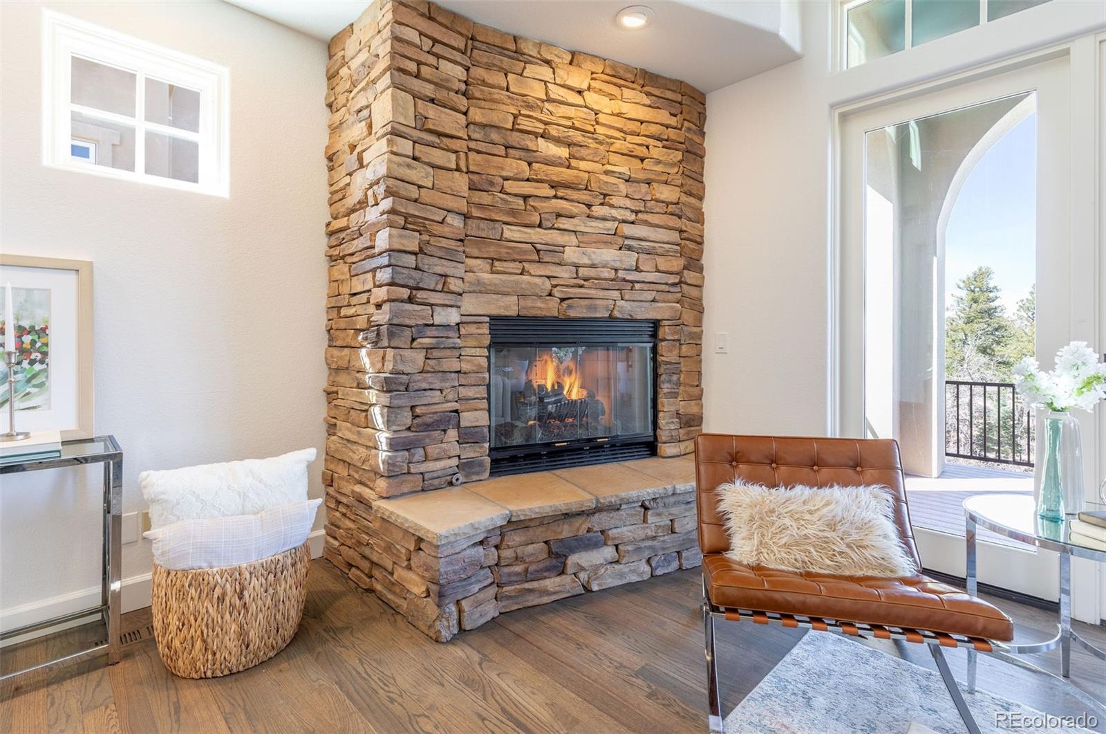 968 Summer Spring View Colorado Springs, CO 80906 - Photo 14 of 40 a living room with furniture and a fireplace