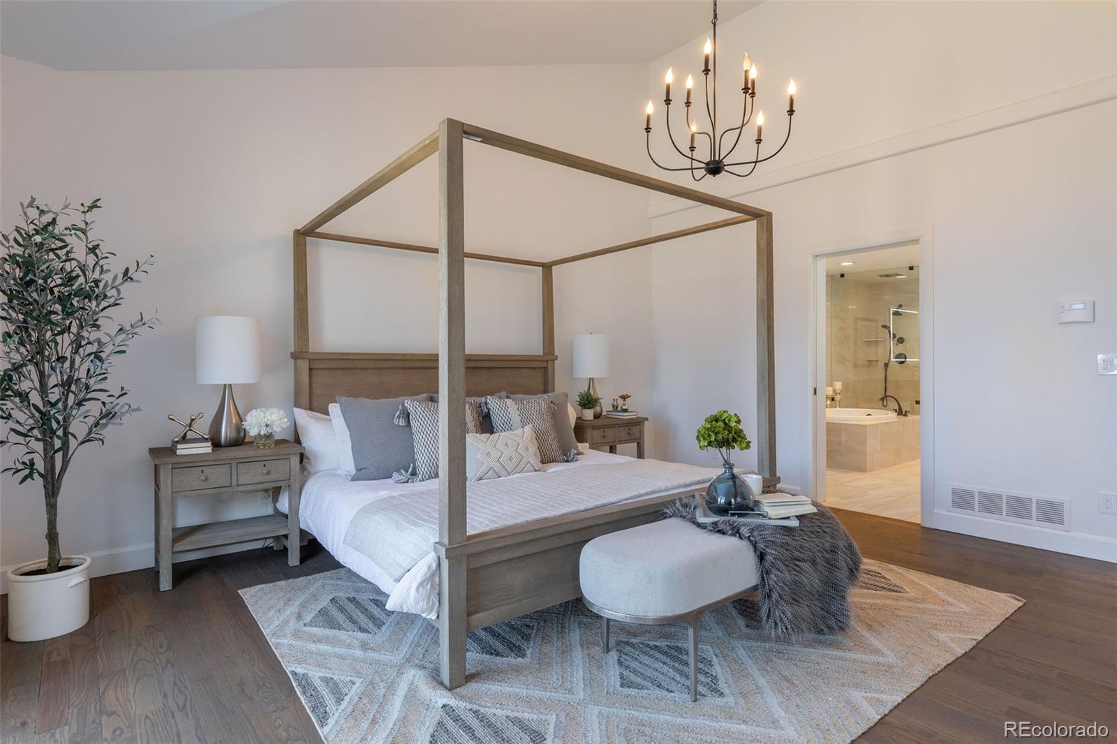 968 Summer Spring View Colorado Springs, CO 80906 - Photo 20 of 40 a living room with furniture and a chandelier
