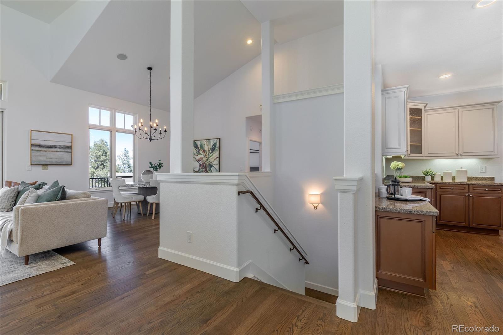 968 Summer Spring View Colorado Springs, CO 80906 - Photo 25 of 40 a living room with furniture window and wooden floor