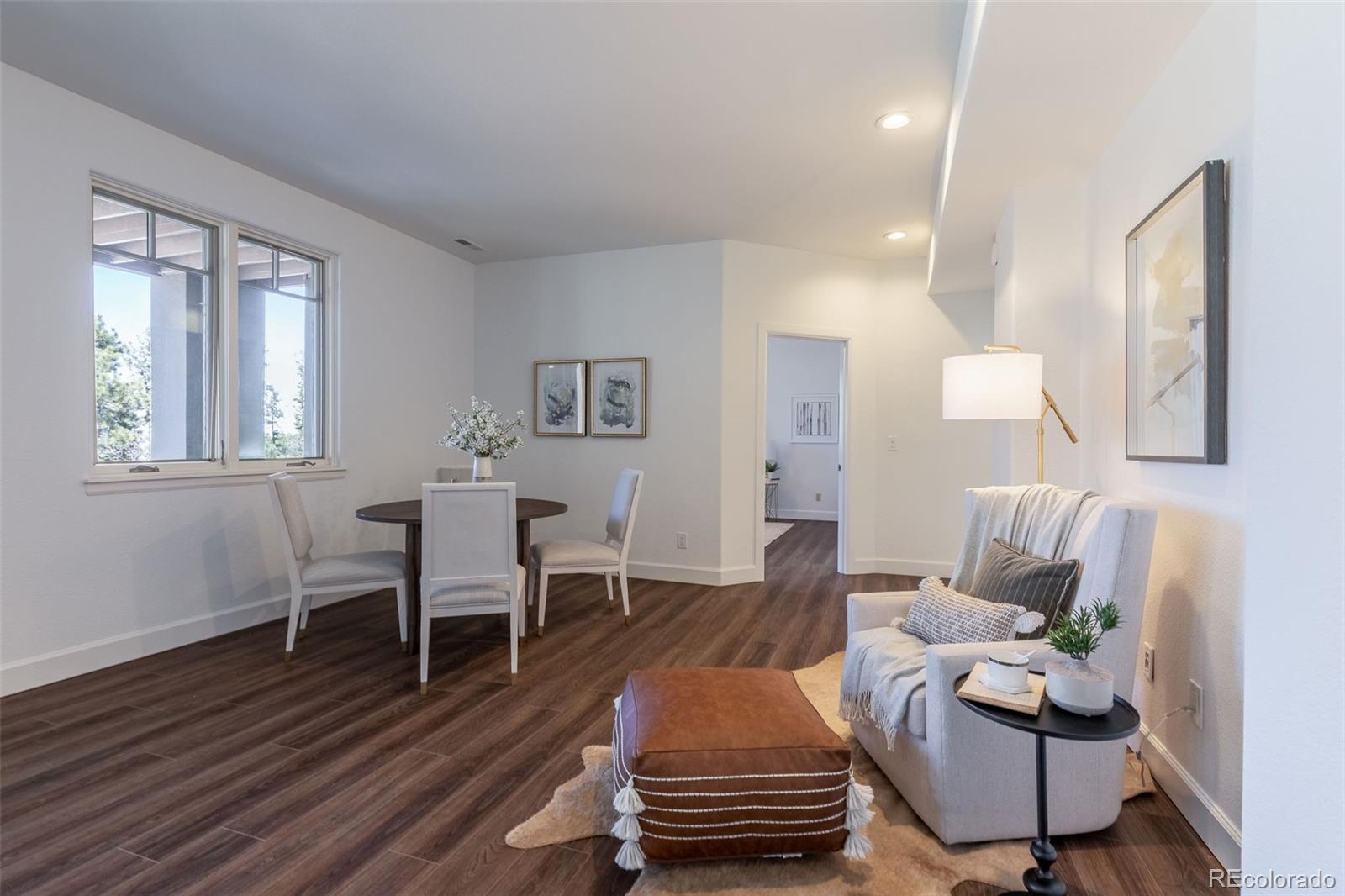 968 Summer Spring View Colorado Springs, CO 80906 - Photo 29 of 40 a living room with furniture and wooden floor