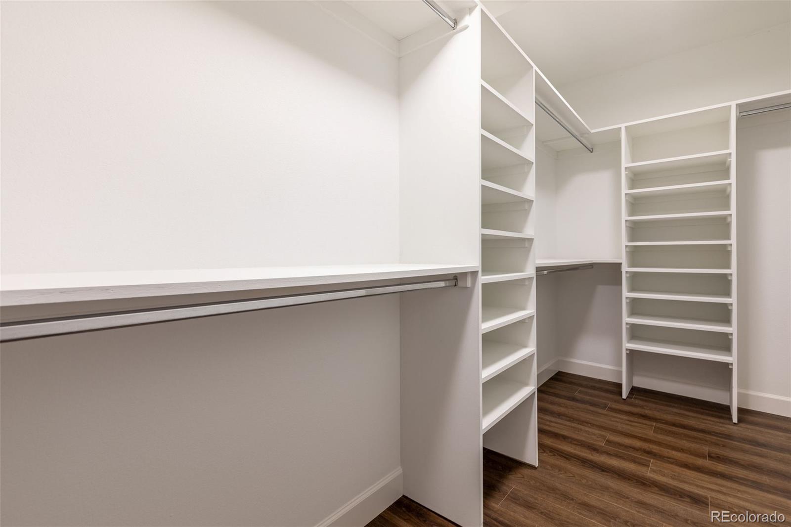 968 Summer Spring View Colorado Springs, CO 80906 - Photo 38 of 40 a view of walk in closet with empty racks