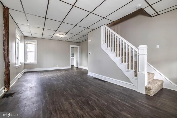 a view of entryway with wooden floor