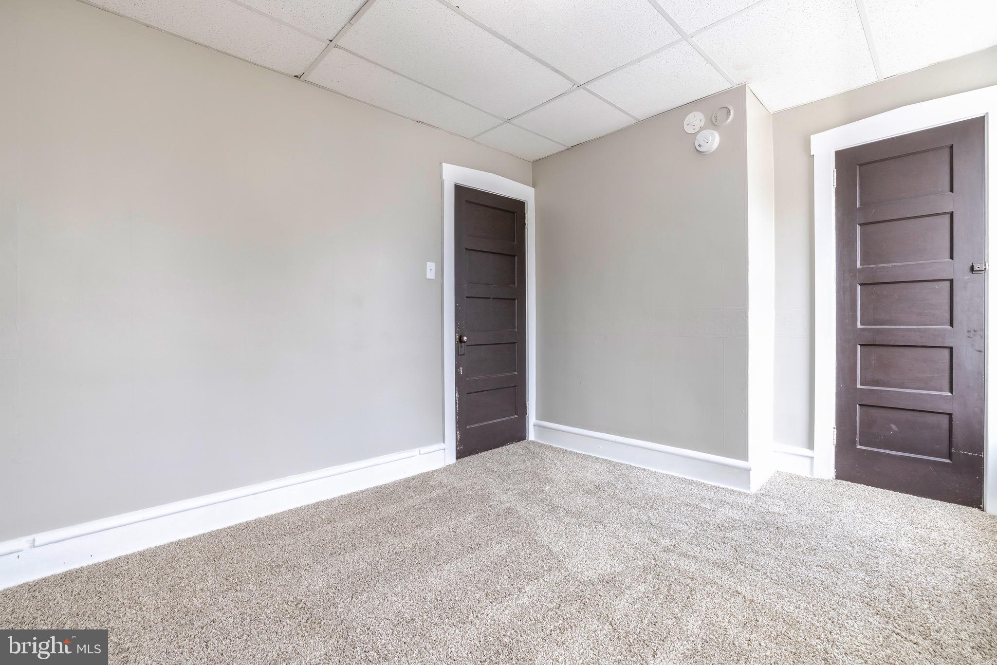 223 3rd Street Gloucester City, NJ 08030 - Photo 9 of 15 a view of an empty room with closet and a window