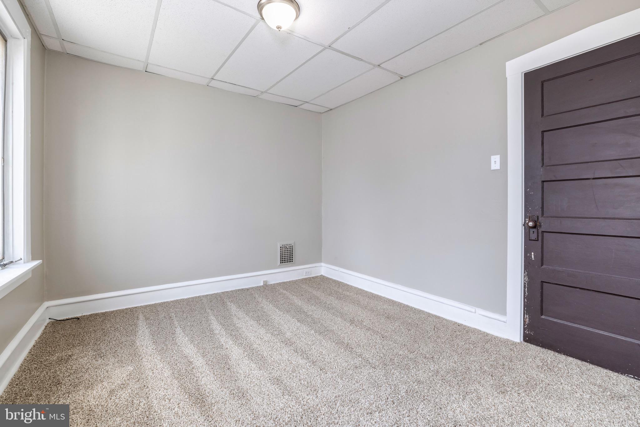 223 3rd Street Gloucester City, NJ 08030 - Photo 10 of 15 a view of an empty room with a window