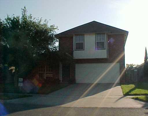 4210 Holly Ridge Drive Corpus Christi, TX 78413 - Photo 1 of 2 a front view of a house with garden