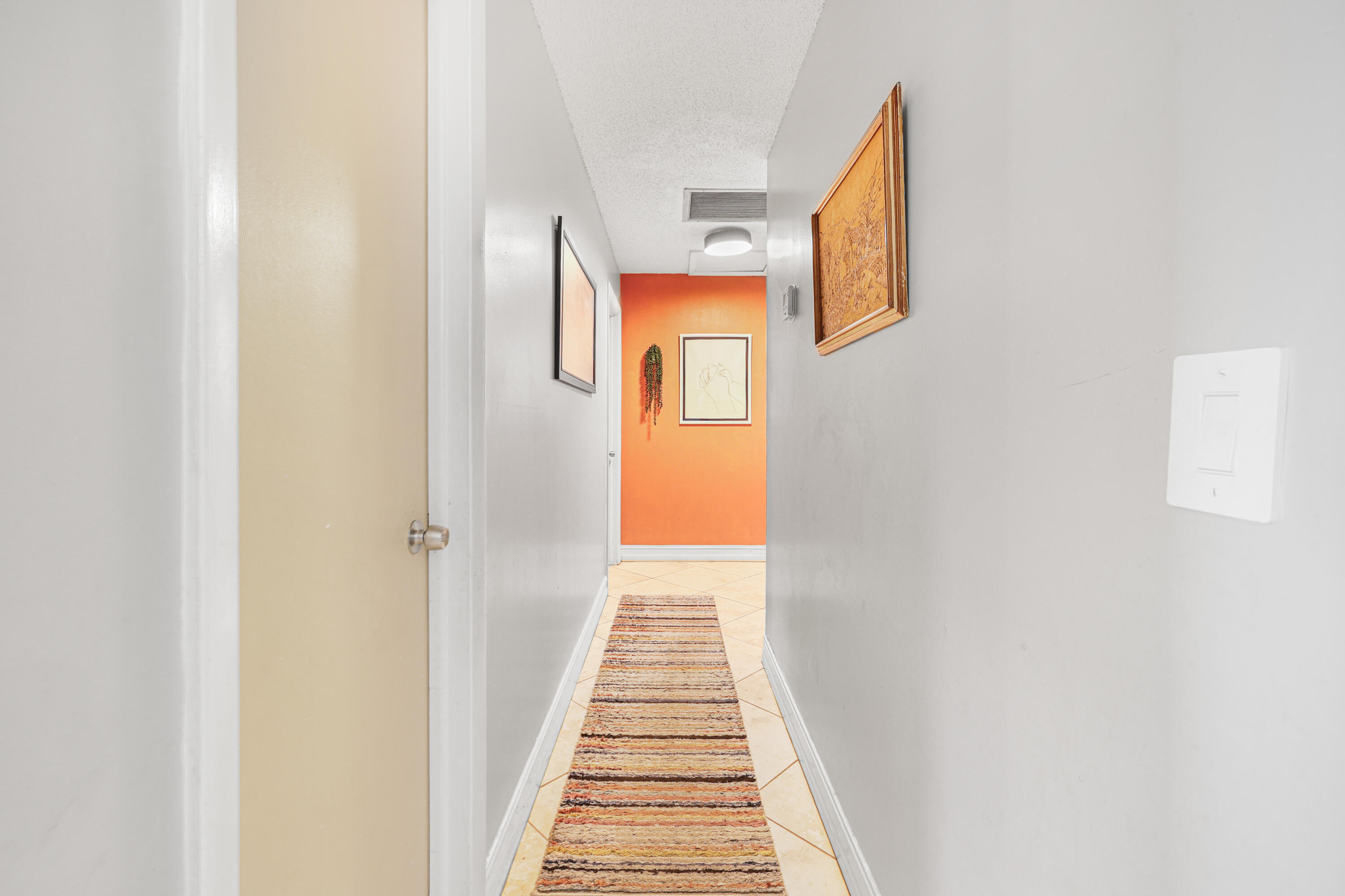 7527 Southwest 7th Street North Lauderdale, FL 33068 - Photo 16 of 34 a view of a hallway with wooden floor