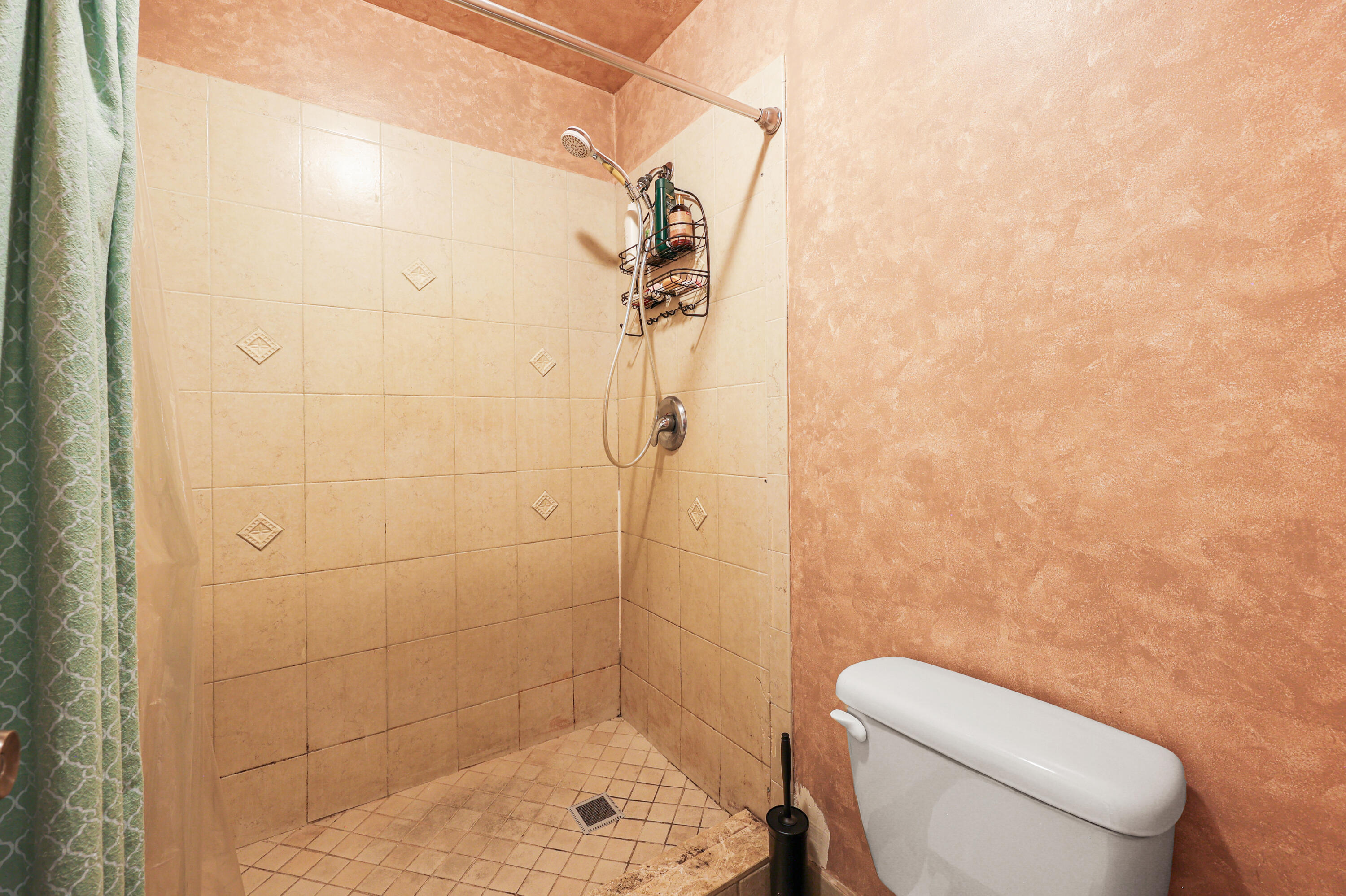 7527 Southwest 7th Street North Lauderdale, FL 33068 - Photo 9 of 34 a bathroom with a toilet and shower