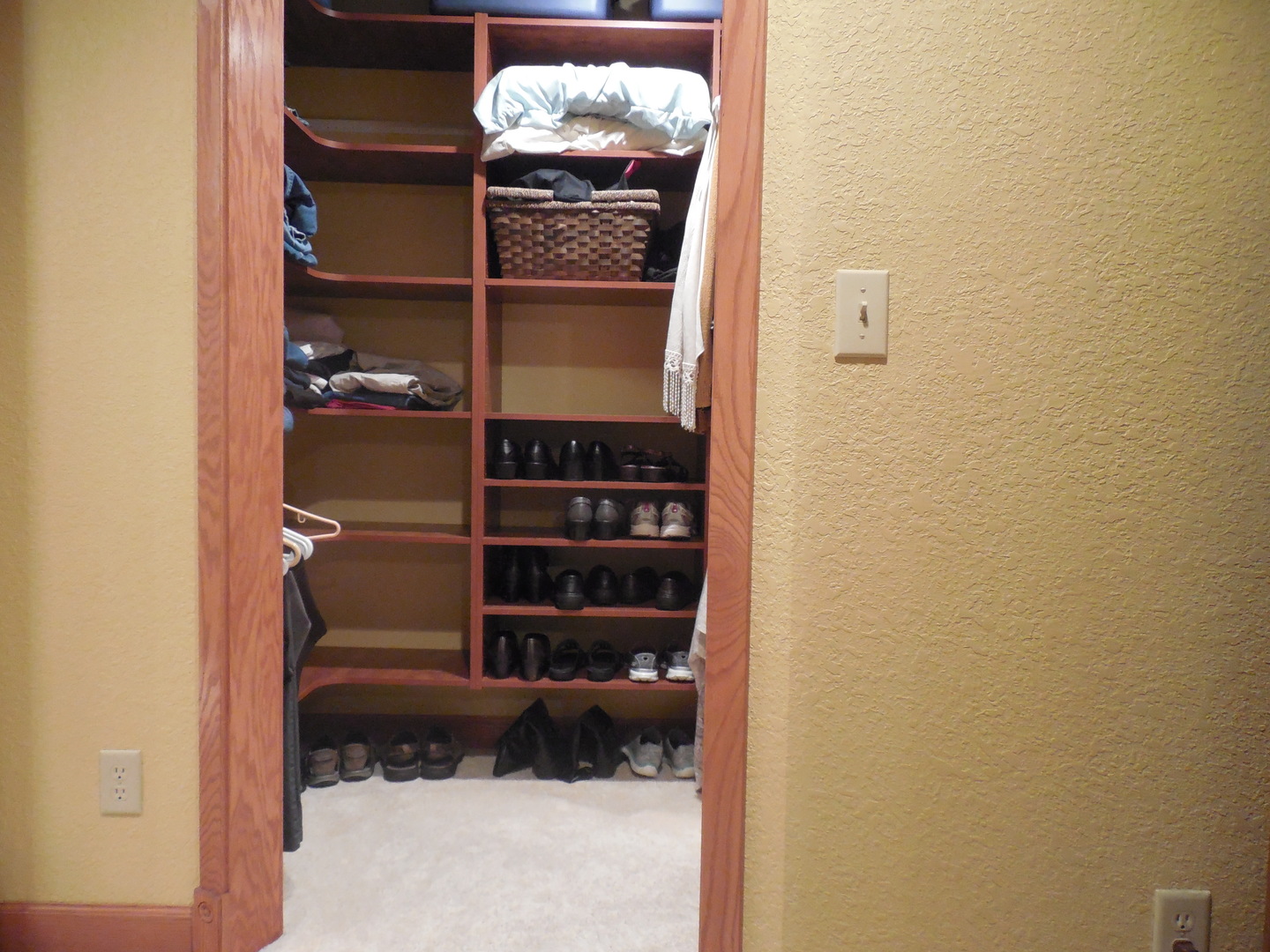 6472 Penrose Road Fulton, IL 61252 - Photo 11 of 21 a view of walk in closet with clothes and shoes