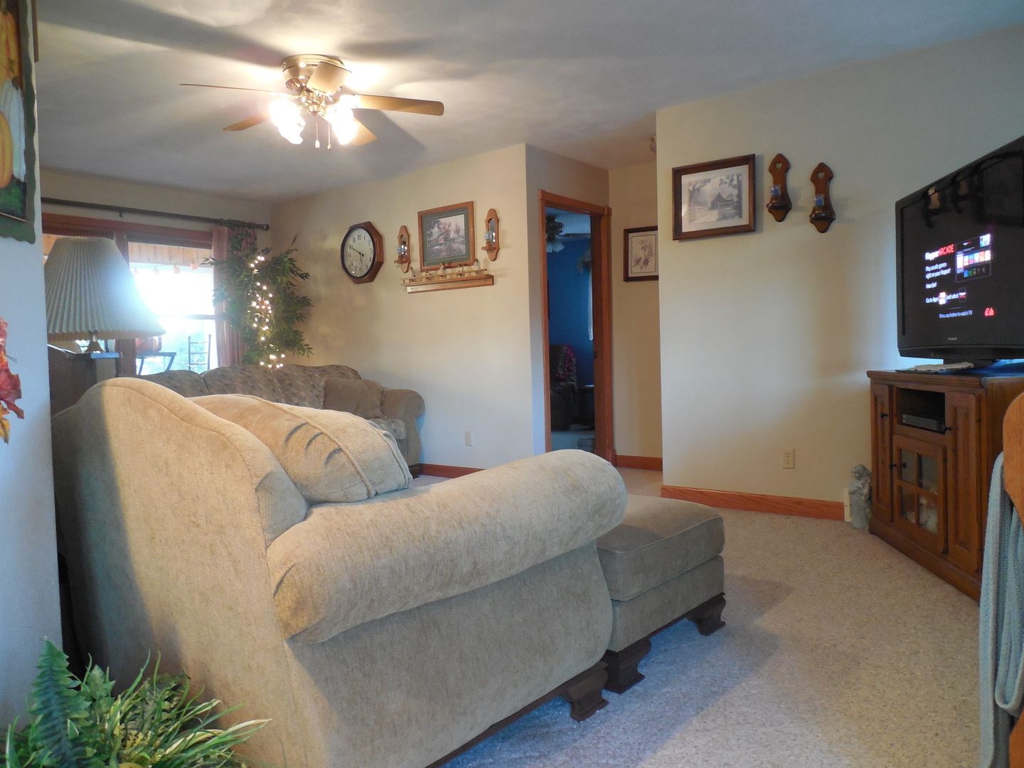 6472 Penrose Road Fulton, IL 61252 - Photo 6 of 21 a bedroom with a bed and a flat screen tv