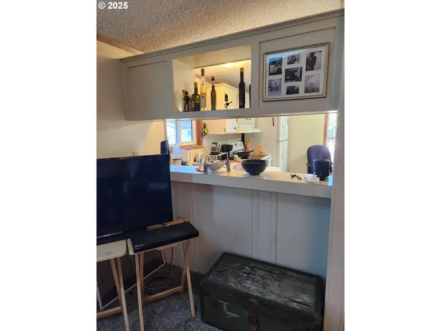 a room with a sink and a cabinets