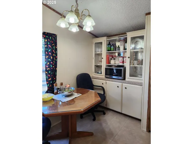 a view of a workspace with furniture