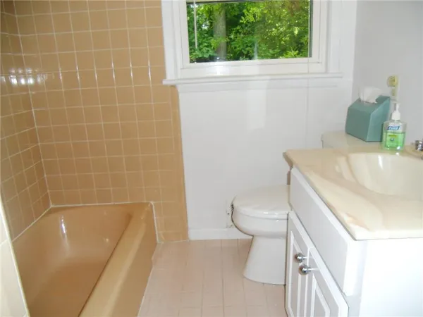 a bathroom with a sink and toilet