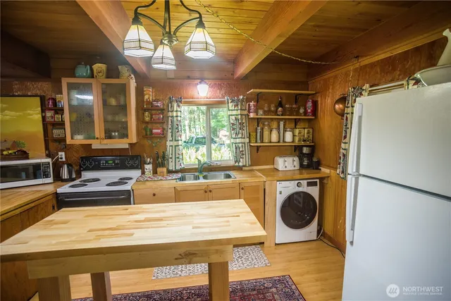 a room with furniture and a large window