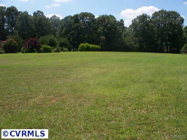 151 Wilson Farm Road Keysville, VA 23947 - Photo 5 of 10 a view of a field with trees in the background