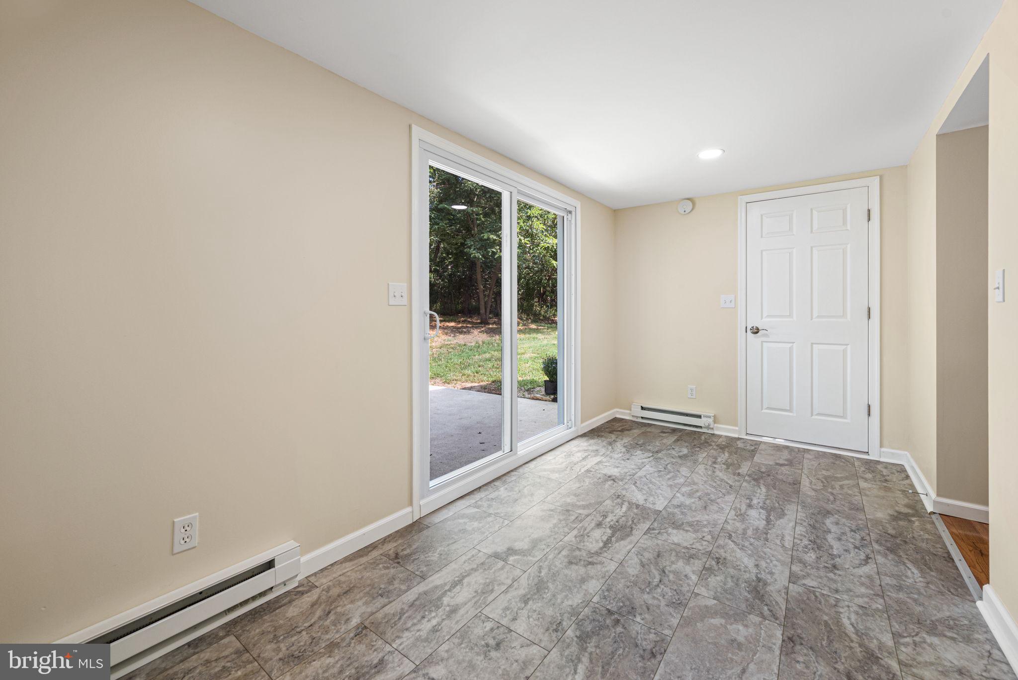1430 South Manor Road Coatesville, PA 19320 - Photo 16 of 30 Rear Room with sliders to Patio