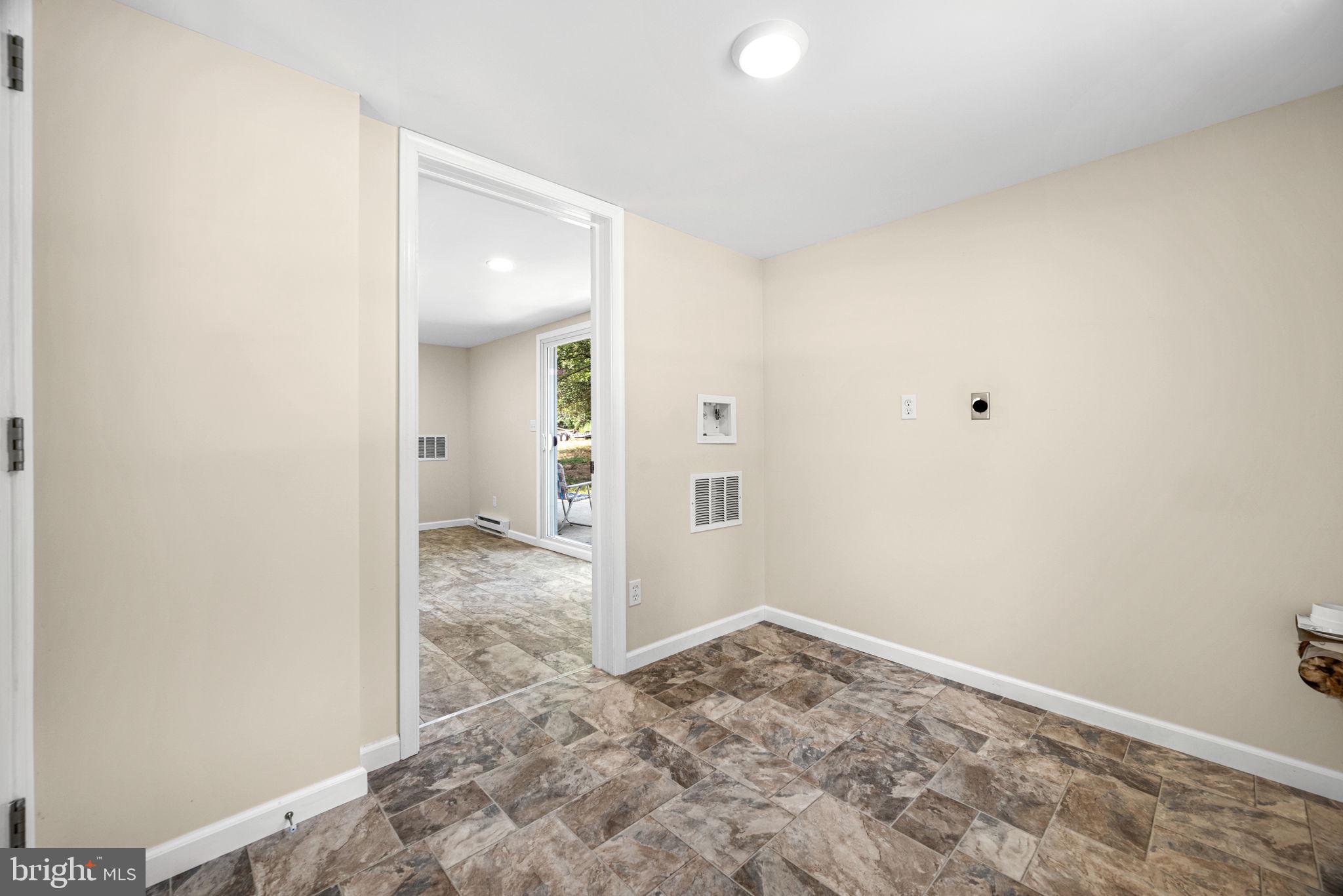 1430 South Manor Road Coatesville, PA 19320 - Photo 17 of 30 Mud Room to rear Room with Sliders to Patio