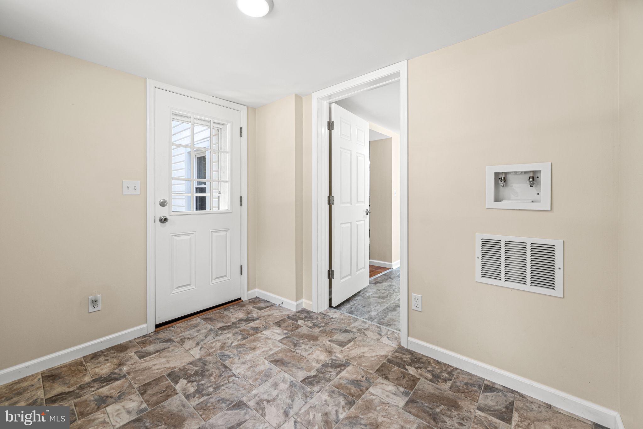 1430 South Manor Road Coatesville, PA 19320 - Photo 18 of 30 Mud Room to Exterior Door @ Side of House