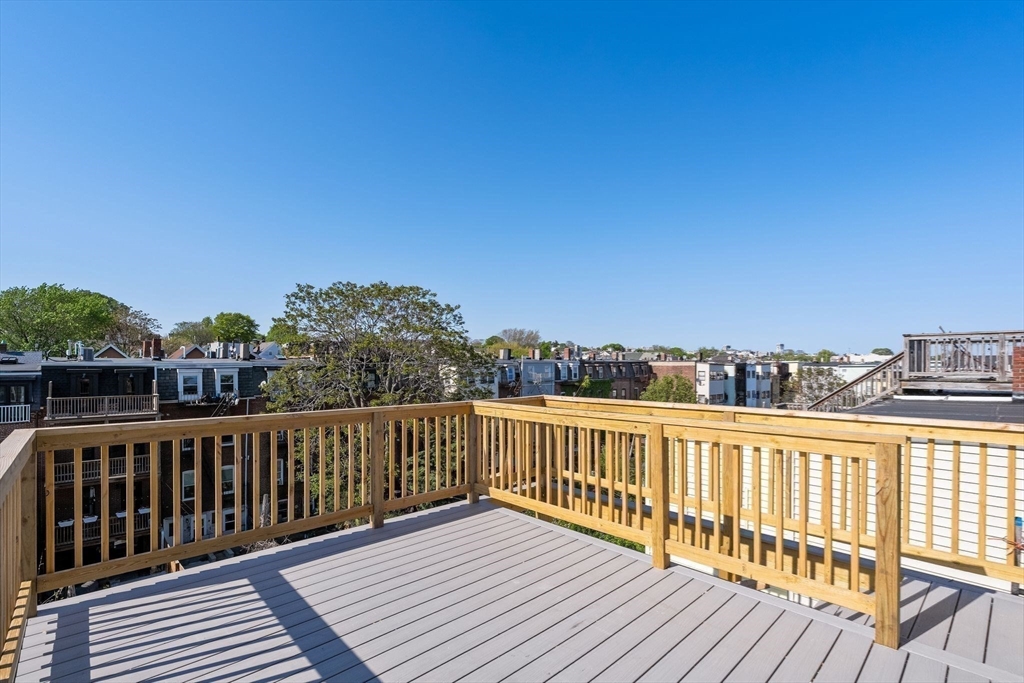 100 Bennington Street, Unit PH4A Boston, MA 02128 - Photo 19 of 41 a view of city from a roof deck