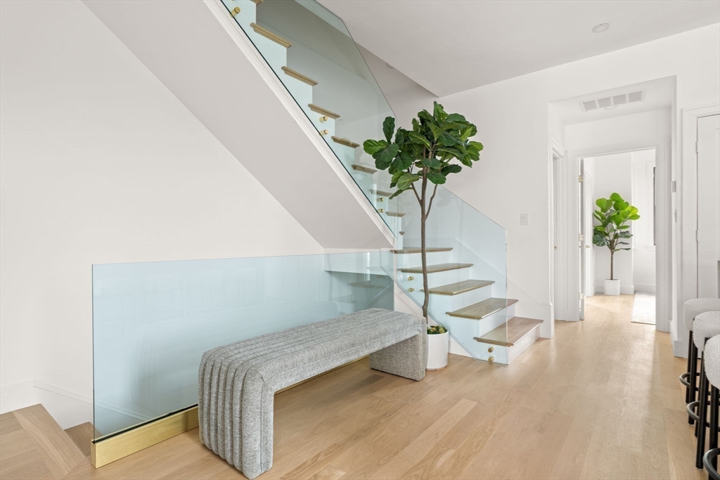 100 Bennington Street, Unit PH4A Boston, MA 02128 - Photo 20 of 41 a view of entryway with wooden floor