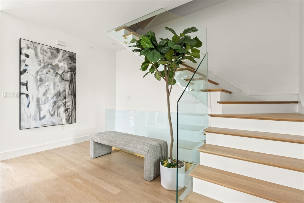 100 Bennington Street, Unit PH4A Boston, MA 02128 - Photo 22 of 41 a view of entryway with wooden floor