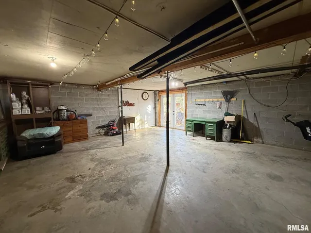 a view of parking garage with cars