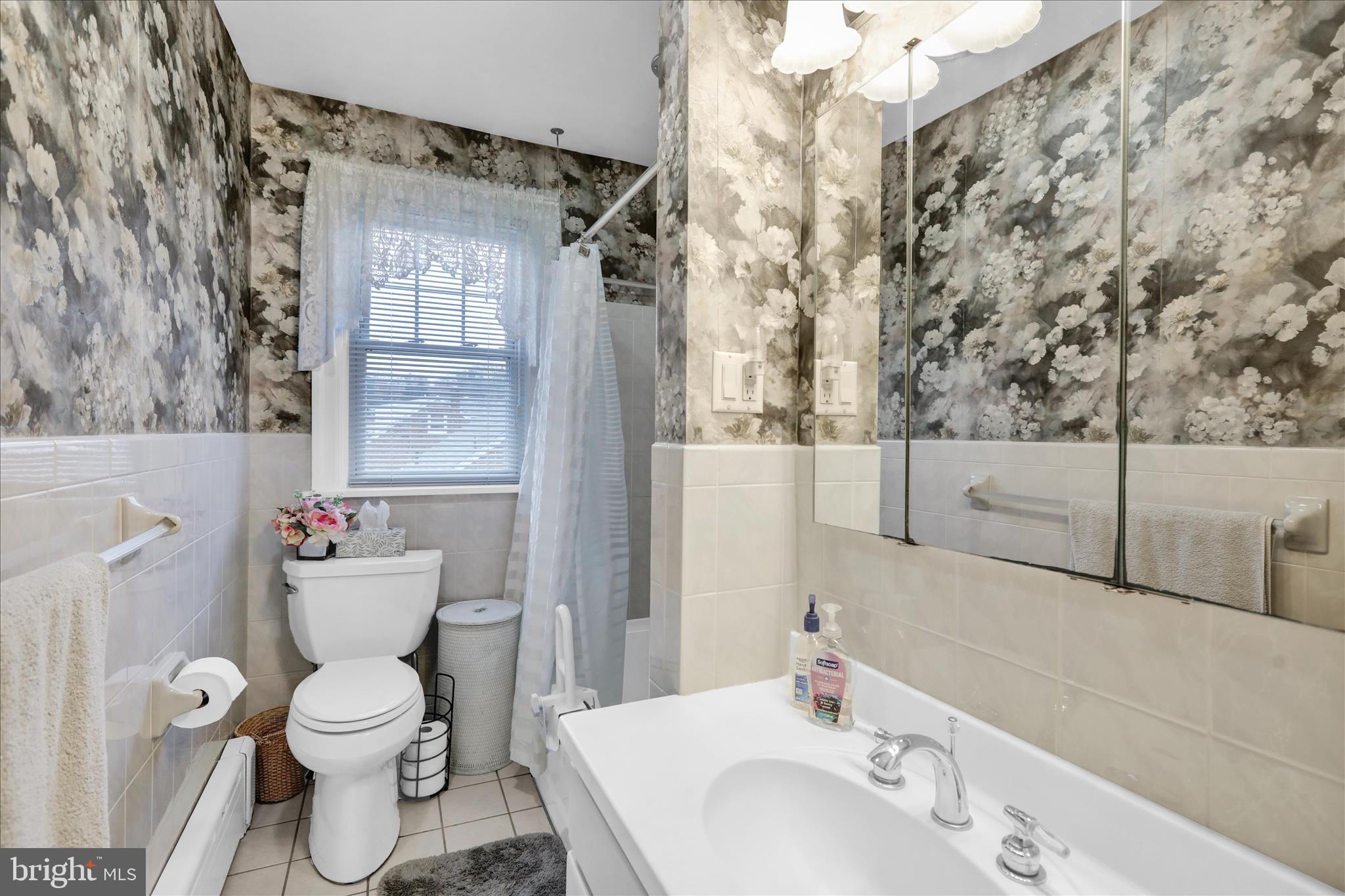 21 Woodland Road Reading, PA 19610 - Photo 16 of 39 a bathroom with a sink toilet and shower