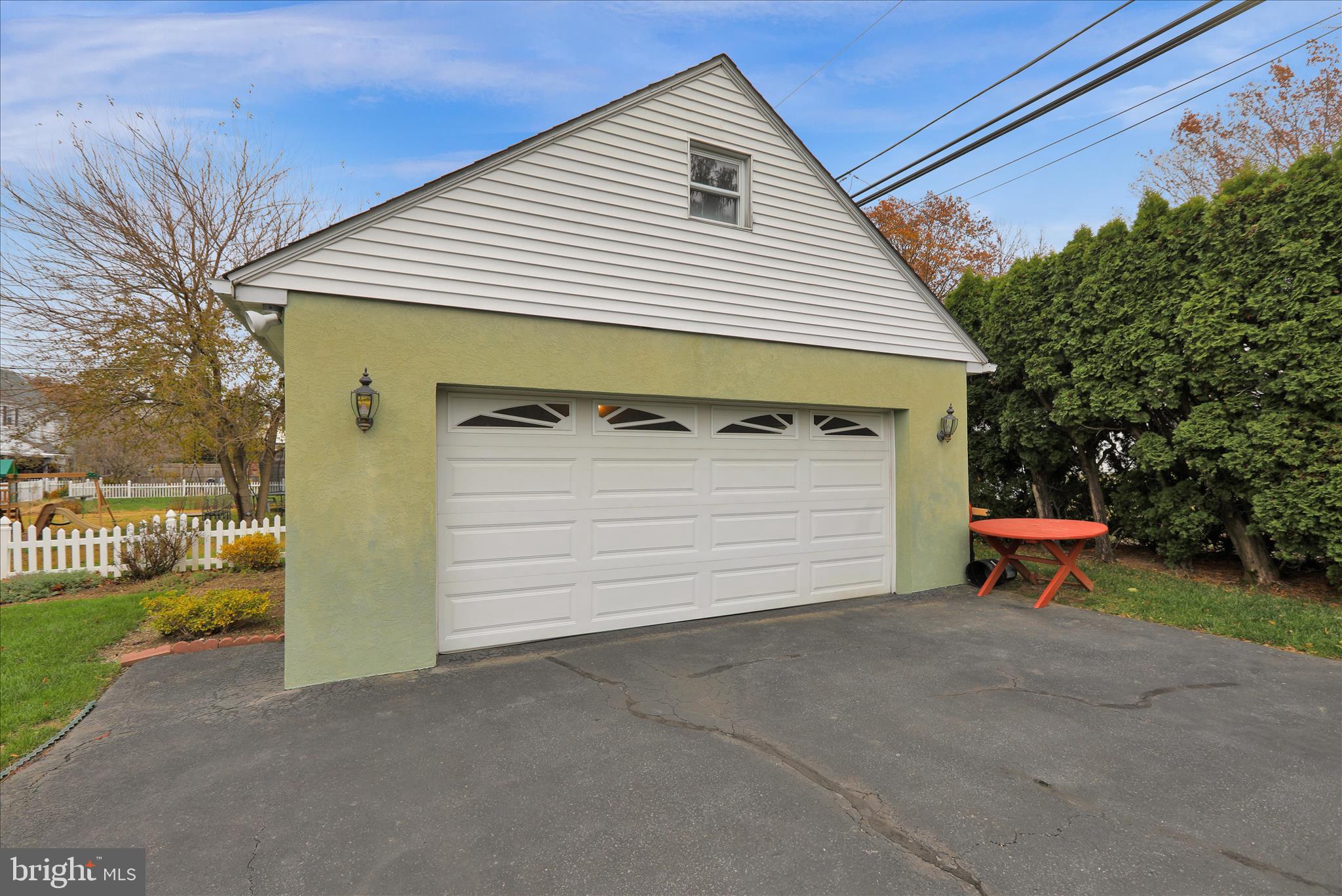 21 Woodland Road Reading, PA 19610 - Photo 29 of 39 a view of a house with a garage and yard