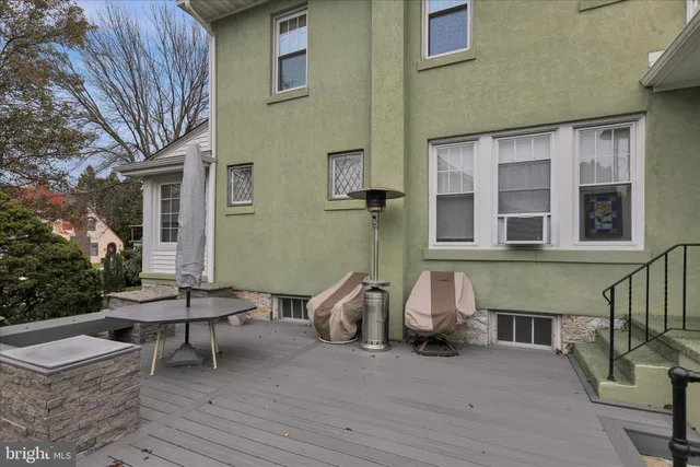 a backyard of a house with seating space