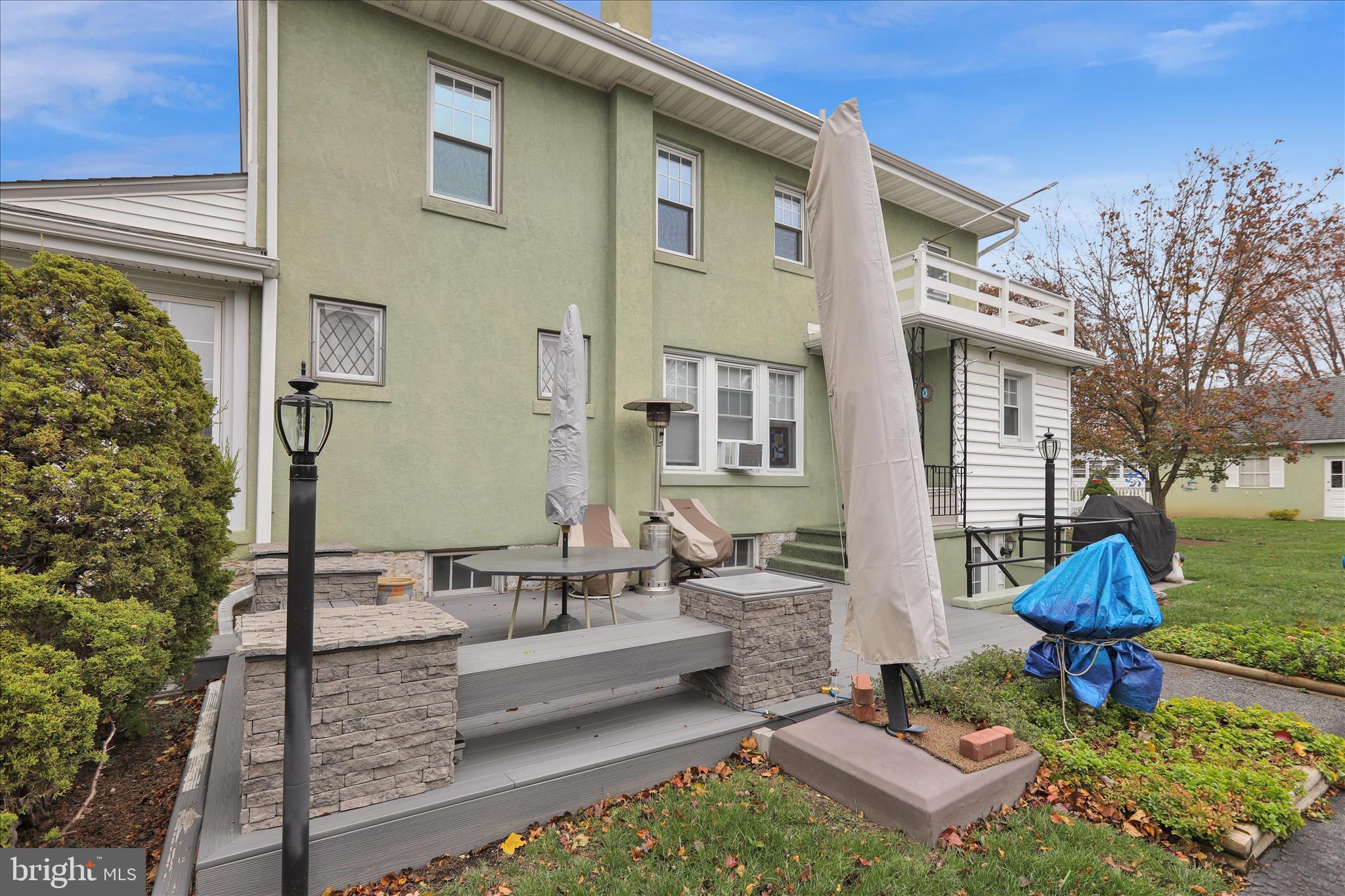 21 Woodland Road Reading, PA 19610 - Photo 37 of 39 a front view of a house with outdoor seating