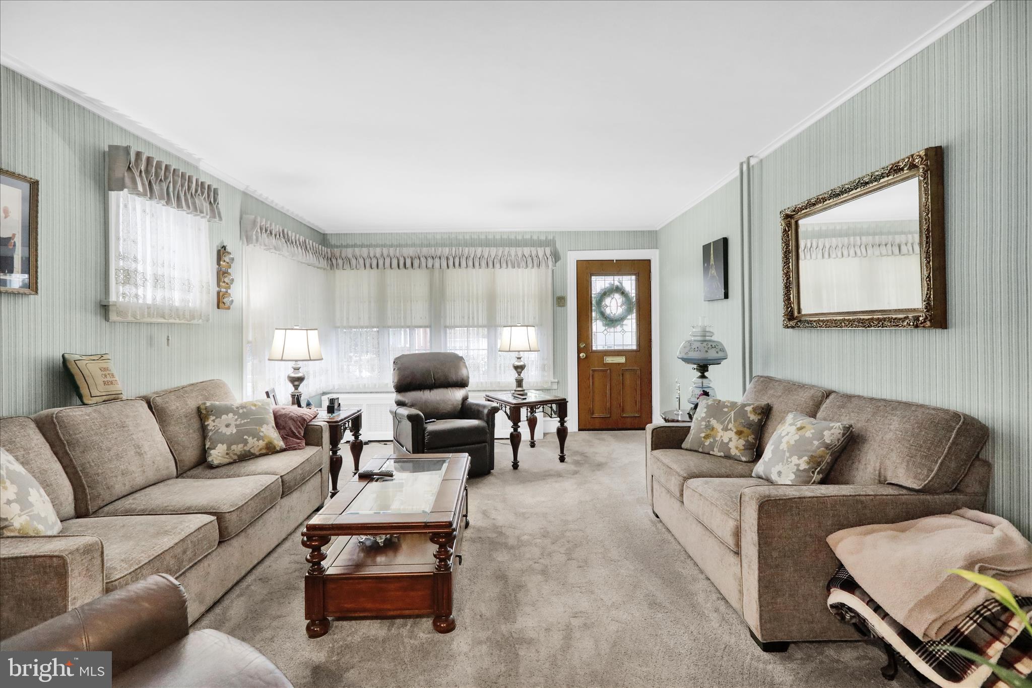 21 Woodland Road Reading, PA 19610 - Photo 9 of 39 a living room with furniture and a couch