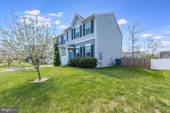 2082 Mallard Lane Locust Grove, VA 22508 - Photo 3 of 32 a house view with a garden space